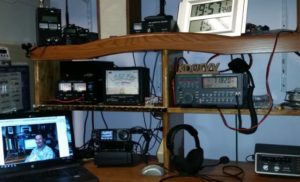 Chris Skinner KCØIVV writes, "Here is my ham desk with the IC-7000 for the 144.250 USB net Running a Diamond x300 vertical up about 50'"